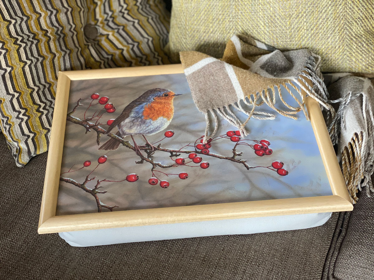 laptray with robin painting on it on sofa 