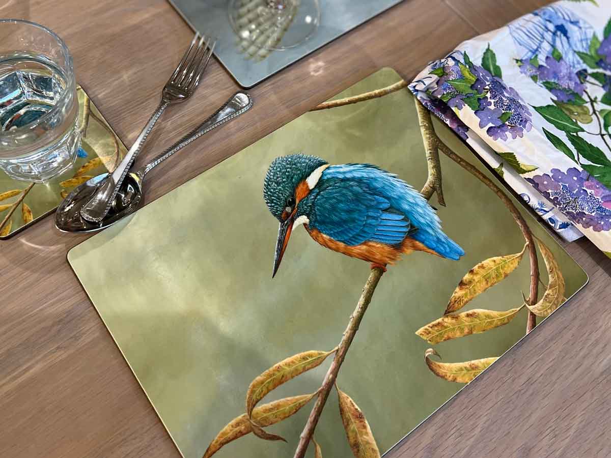 table placemat with kingfisher and cutlery and napkin