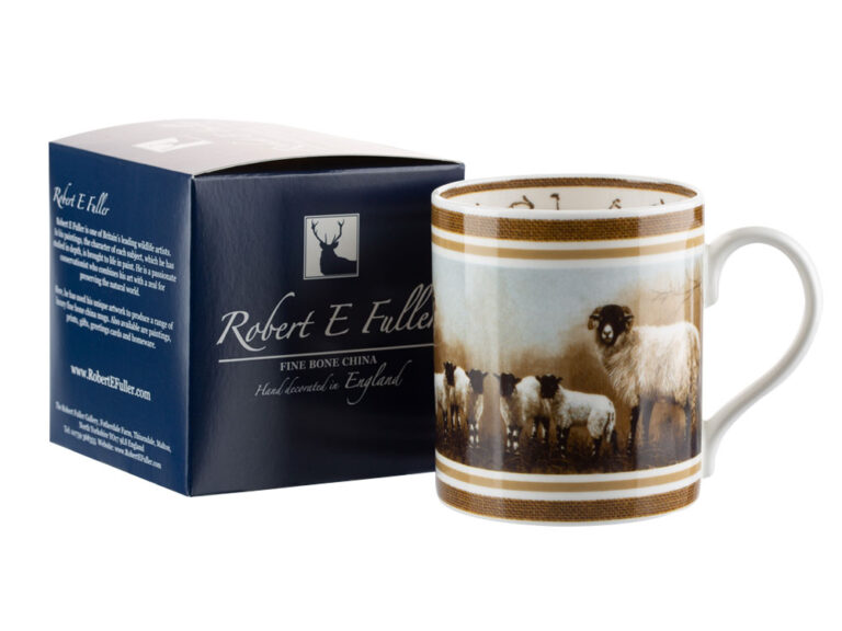 A coffee cup with gift box. llustration of a Sheep and lambs by nature artist Robert E Fuller